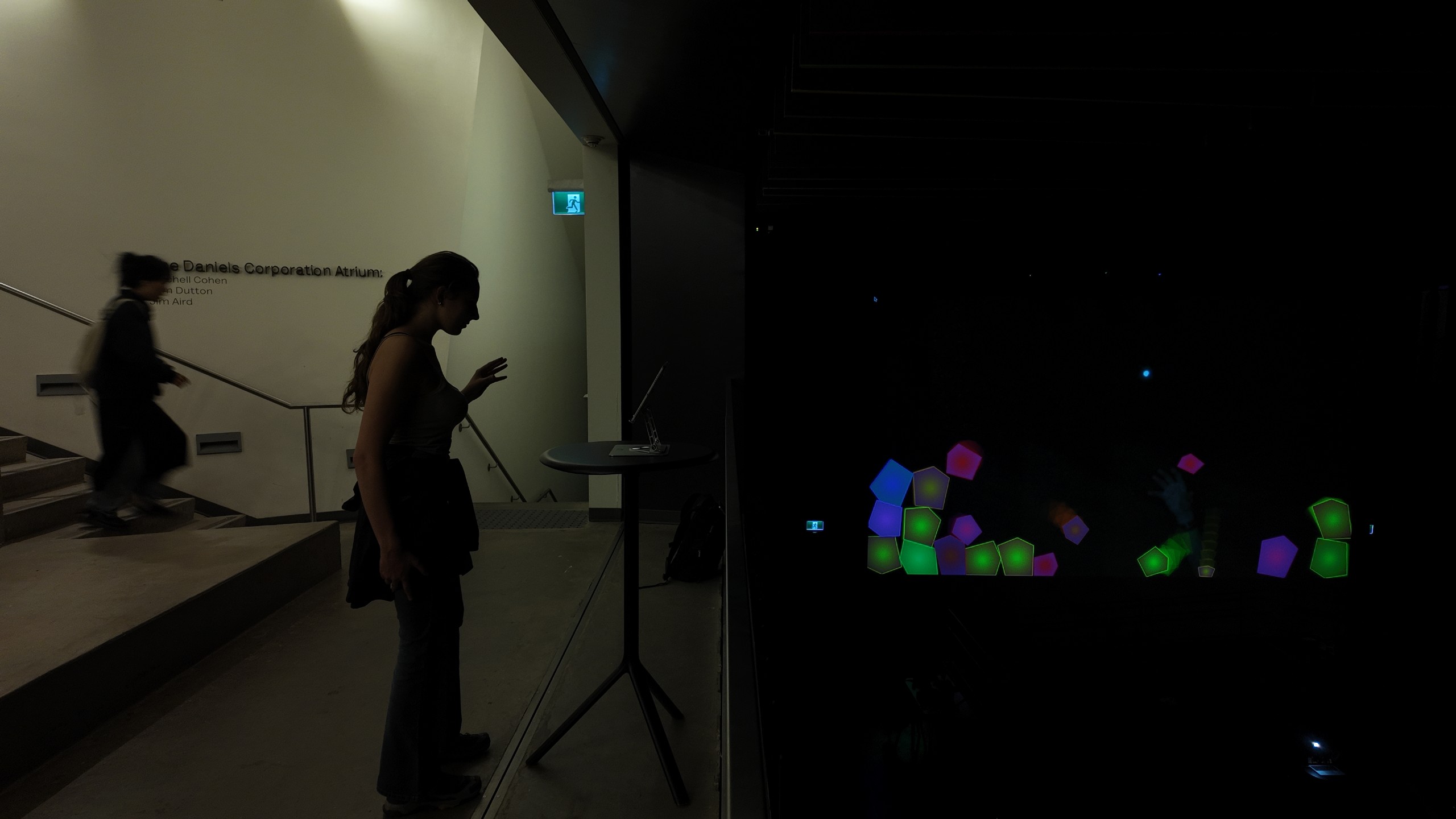 Participant encountering the responsive projection from the edge of the room