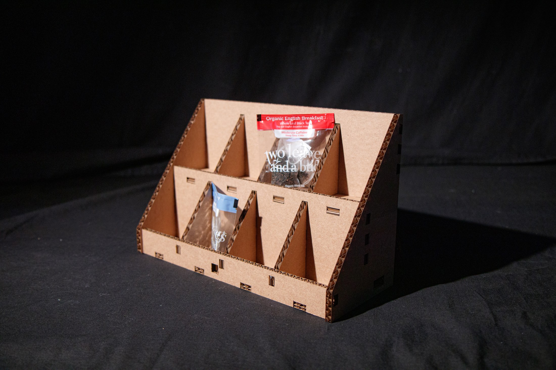 Angled view of the slotted tea display prototype